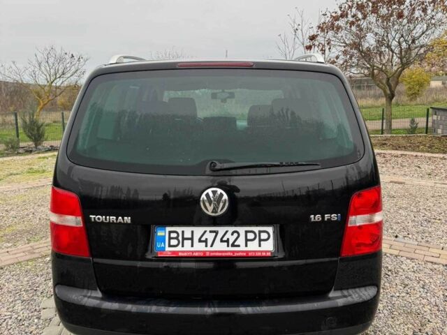 Черный Фольксваген Туран, объемом двигателя 1.6 л и пробегом 264 тыс. км за 5000 $, фото 2 на Automoto.ua