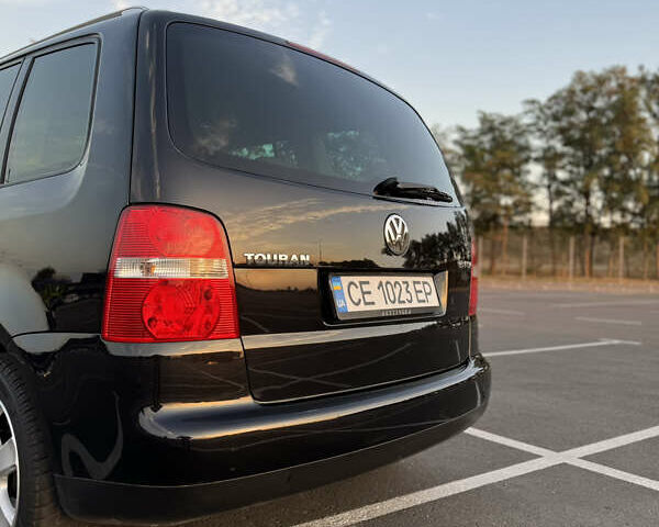 Черный Фольксваген Туран, объемом двигателя 1.6 л и пробегом 253 тыс. км за 5500 $, фото 13 на Automoto.ua