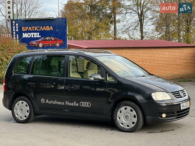 Черный Фольксваген Туран, объемом двигателя 1.6 л и пробегом 195 тыс. км за 5100 $, фото 4 на Automoto.ua