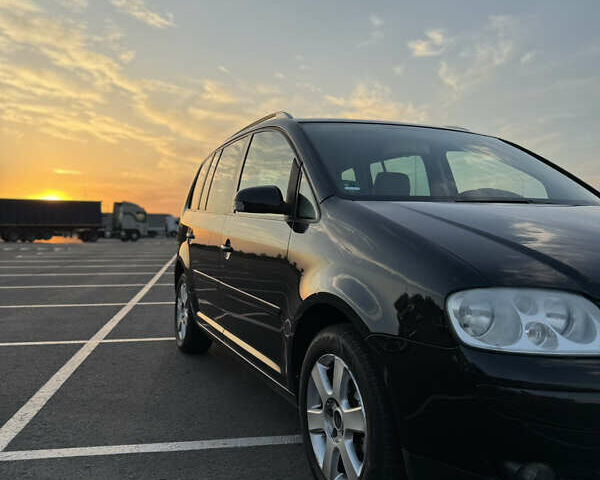 Черный Фольксваген Туран, объемом двигателя 1.6 л и пробегом 253 тыс. км за 5500 $, фото 6 на Automoto.ua