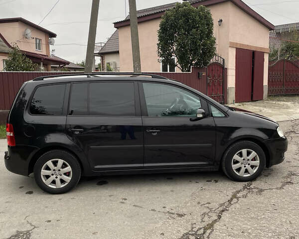 Черный Фольксваген Туран, объемом двигателя 1.6 л и пробегом 235 тыс. км за 6500 $, фото 8 на Automoto.ua