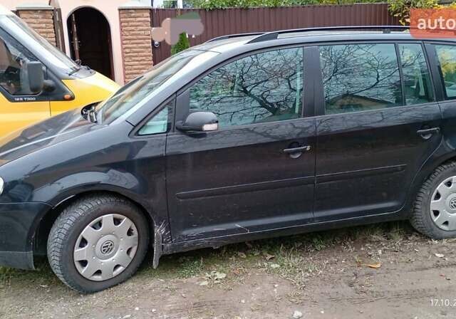 Черный Фольксваген Туран, объемом двигателя 1.6 л и пробегом 314 тыс. км за 5500 $, фото 1 на Automoto.ua