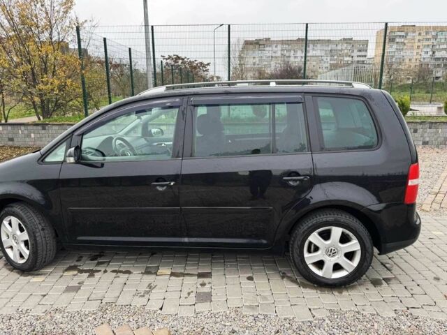 Черный Фольксваген Туран, объемом двигателя 1.6 л и пробегом 264 тыс. км за 5000 $, фото 6 на Automoto.ua