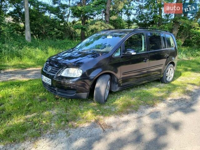 Черный Фольксваген Туран, объемом двигателя 1.9 л и пробегом 336 тыс. км за 2950 $, фото 1 на Automoto.ua