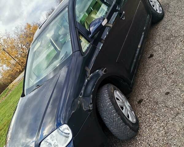 Черный Фольксваген Туран, объемом двигателя 1.6 л и пробегом 218 тыс. км за 5600 $, фото 6 на Automoto.ua