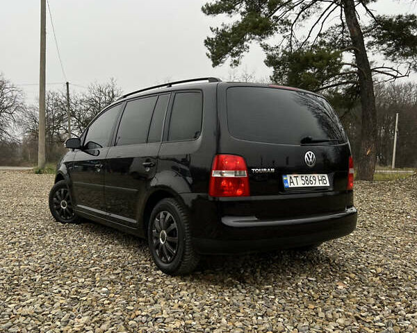 Черный Фольксваген Туран, объемом двигателя 1.6 л и пробегом 208 тыс. км за 5700 $, фото 16 на Automoto.ua