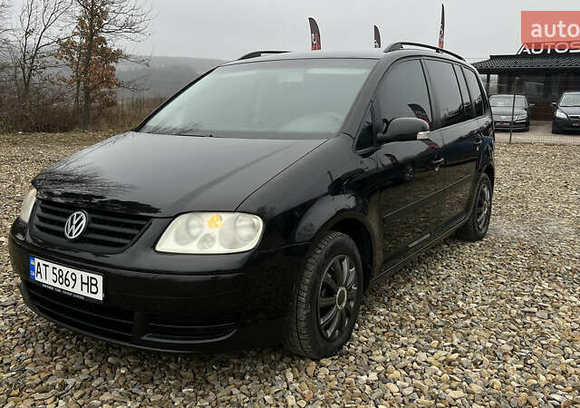 Черный Фольксваген Туран, объемом двигателя 1.6 л и пробегом 208 тыс. км за 5700 $, фото 33 на Automoto.ua