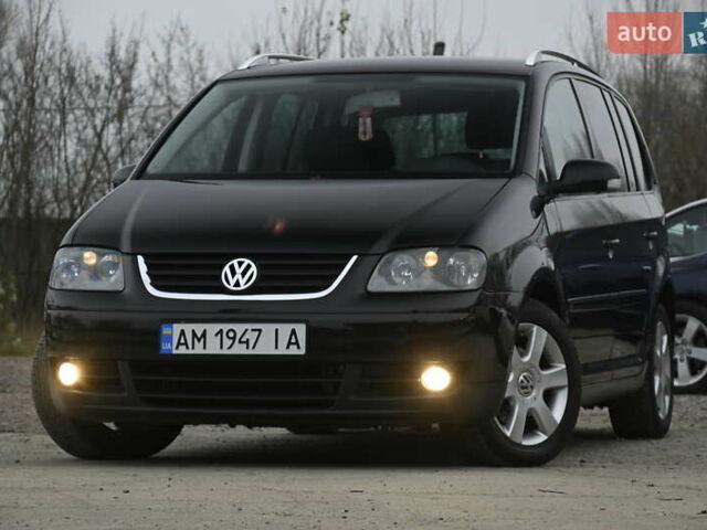 Чорний Фольксваген Туран, об'ємом двигуна 2 л та пробігом 267 тис. км за 5999 $, фото 6 на Automoto.ua