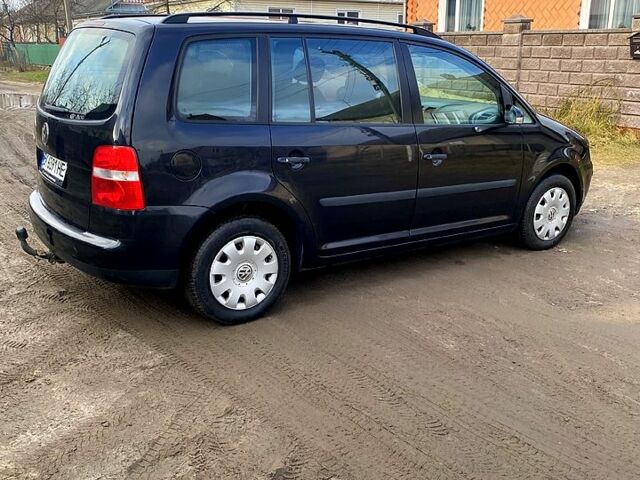 Чорний Фольксваген Туран, об'ємом двигуна 1.6 л та пробігом 205 тис. км за 5200 $, фото 2 на Automoto.ua