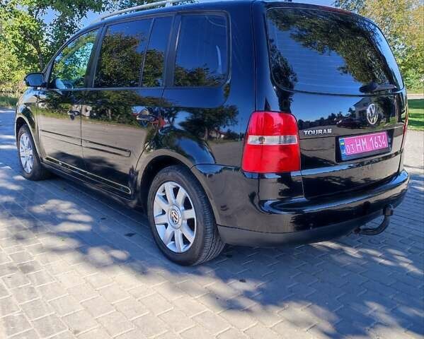 Чорний Фольксваген Туран, об'ємом двигуна 1.6 л та пробігом 190 тис. км за 5500 $, фото 4 на Automoto.ua