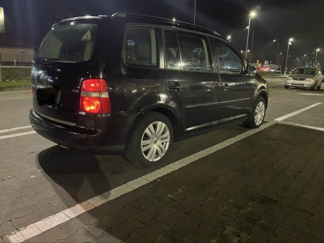 Черный Фольксваген Туран, объемом двигателя 1.9 л и пробегом 267 тыс. км за 2950 $, фото 1 на Automoto.ua