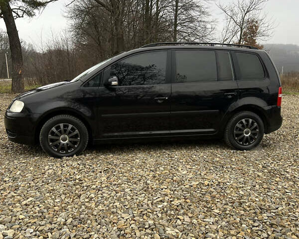 Черный Фольксваген Туран, объемом двигателя 1.6 л и пробегом 208 тыс. км за 5700 $, фото 18 на Automoto.ua