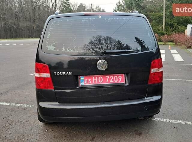 Черный Фольксваген Туран, объемом двигателя 1.6 л и пробегом 240 тыс. км за 5700 $, фото 3 на Automoto.ua