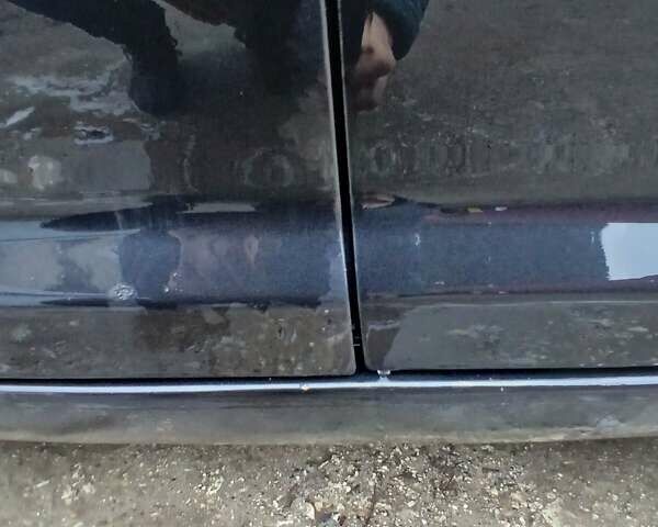 Черный Фольксваген Туран, объемом двигателя 1.6 л и пробегом 201 тыс. км за 4799 $, фото 29 на Automoto.ua