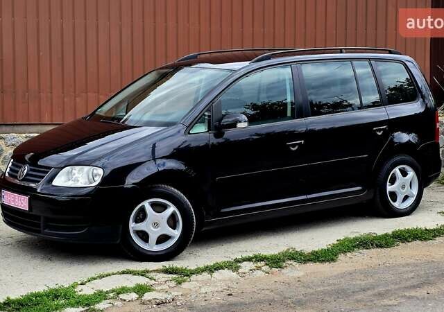 Черный Фольксваген Туран, объемом двигателя 1.6 л и пробегом 239 тыс. км за 6777 $, фото 31 на Automoto.ua