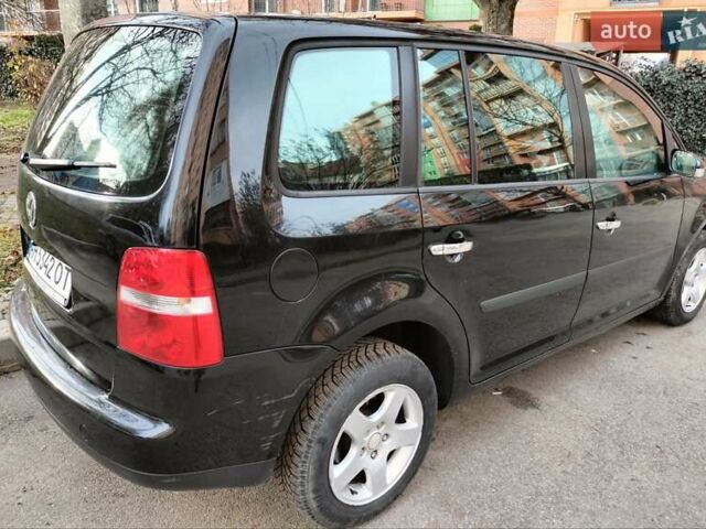 Черный Фольксваген Туран, объемом двигателя 1.6 л и пробегом 202 тыс. км за 5300 $, фото 3 на Automoto.ua