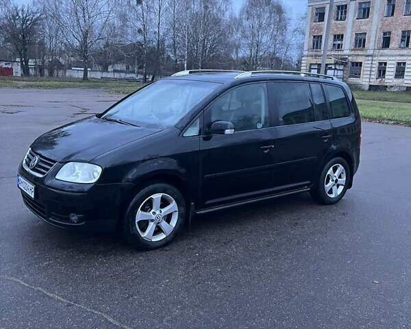 Черный Фольксваген Туран, объемом двигателя 1.97 л и пробегом 293 тыс. км за 5900 $, фото 4 на Automoto.ua