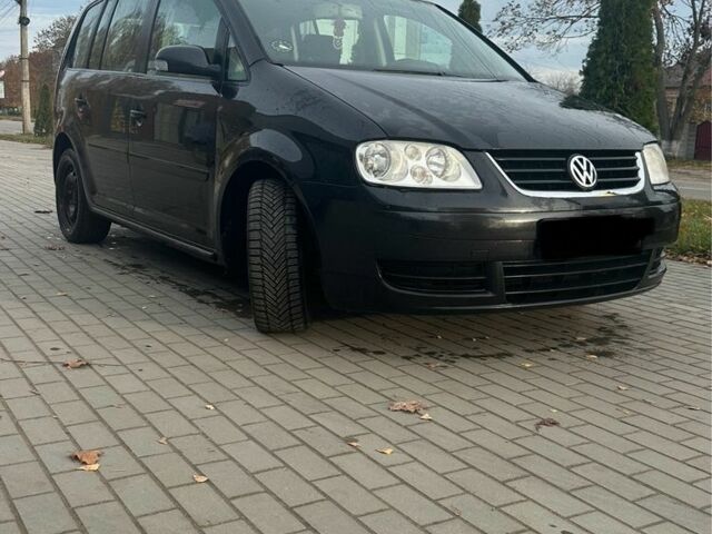 Чорний Фольксваген Туран, об'ємом двигуна 2 л та пробігом 300 тис. км за 2500 $, фото 4 на Automoto.ua