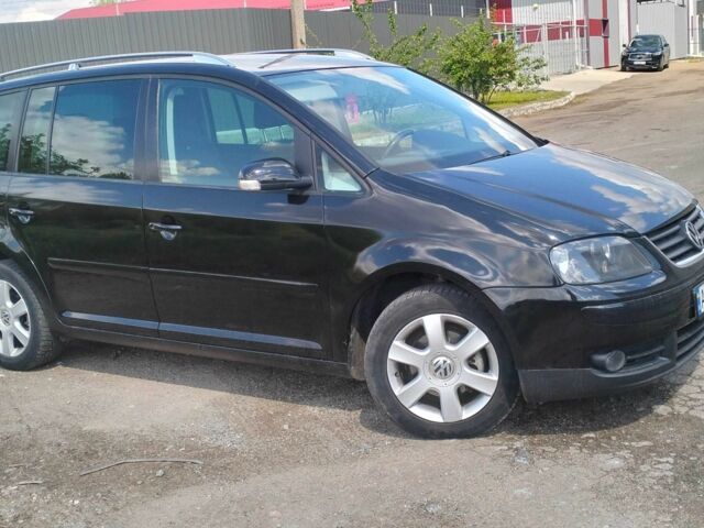 Черный Фольксваген Туран, объемом двигателя 2 л и пробегом 260 тыс. км за 6500 $, фото 2 на Automoto.ua