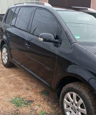 Черный Фольксваген Туран, объемом двигателя 1.6 л и пробегом 260 тыс. км за 5600 $, фото 3 на Automoto.ua