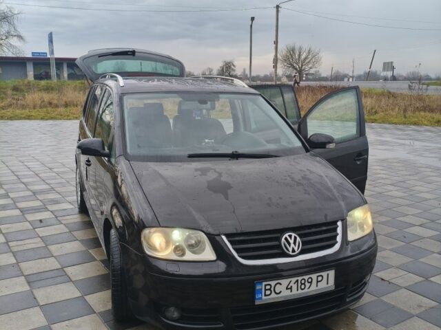 Черный Фольксваген Туран, объемом двигателя 2 л и пробегом 264 тыс. км за 6500 $, фото 4 на Automoto.ua