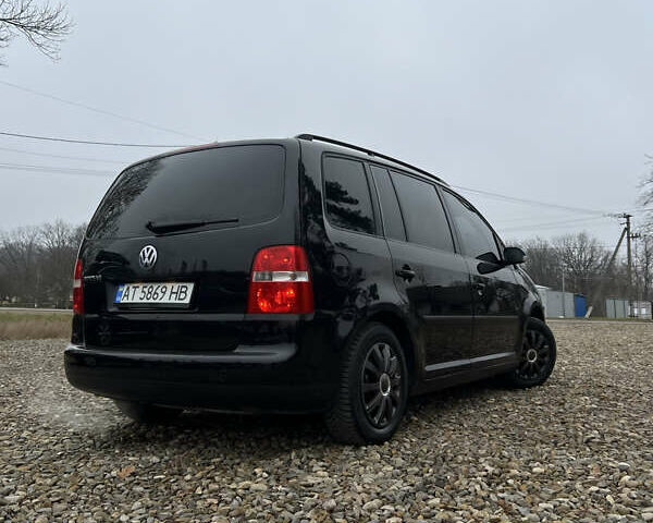 Черный Фольксваген Туран, объемом двигателя 1.6 л и пробегом 208 тыс. км за 5700 $, фото 13 на Automoto.ua