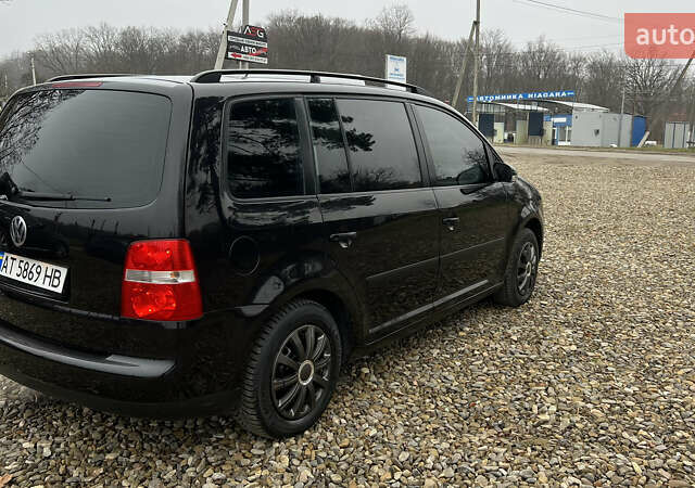 Черный Фольксваген Туран, объемом двигателя 1.6 л и пробегом 208 тыс. км за 5700 $, фото 35 на Automoto.ua