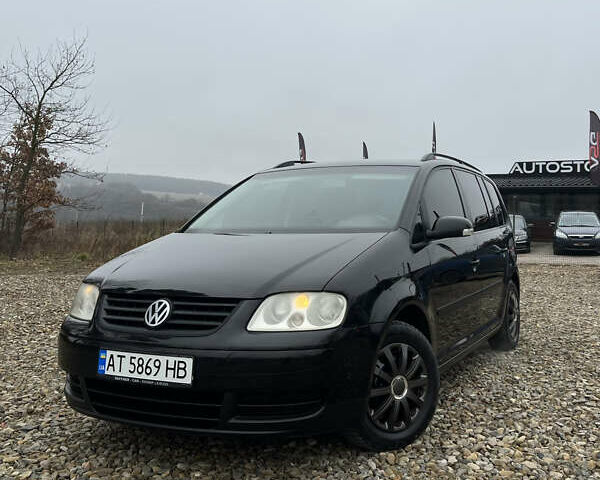 Черный Фольксваген Туран, объемом двигателя 1.6 л и пробегом 208 тыс. км за 5700 $, фото 5 на Automoto.ua