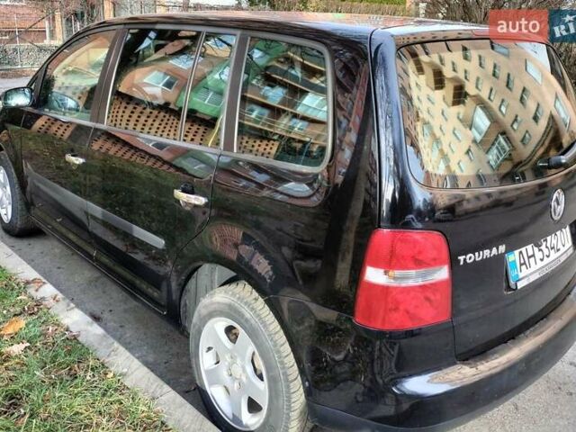 Черный Фольксваген Туран, объемом двигателя 1.6 л и пробегом 202 тыс. км за 5300 $, фото 4 на Automoto.ua