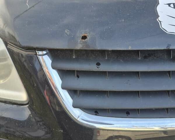 Черный Фольксваген Туран, объемом двигателя 1.9 л и пробегом 352 тыс. км за 4500 $, фото 2 на Automoto.ua