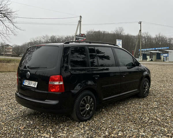 Черный Фольксваген Туран, объемом двигателя 1.6 л и пробегом 208 тыс. км за 5700 $, фото 20 на Automoto.ua