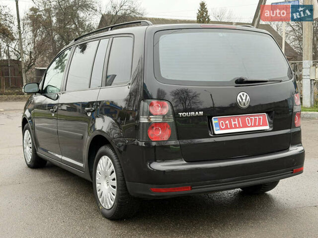 Черный Фольксваген Туран, объемом двигателя 1.6 л и пробегом 214 тыс. км за 5999 $, фото 19 на Automoto.ua