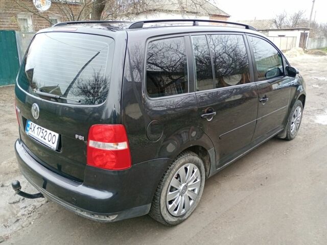 Черный Фольксваген Туран, объемом двигателя 1.6 л и пробегом 220 тыс. км за 6300 $, фото 4 на Automoto.ua