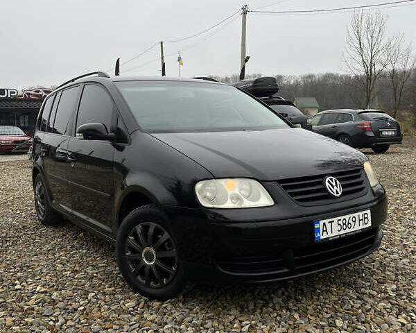 Черный Фольксваген Туран, объемом двигателя 1.6 л и пробегом 208 тыс. км за 5700 $, фото 6 на Automoto.ua