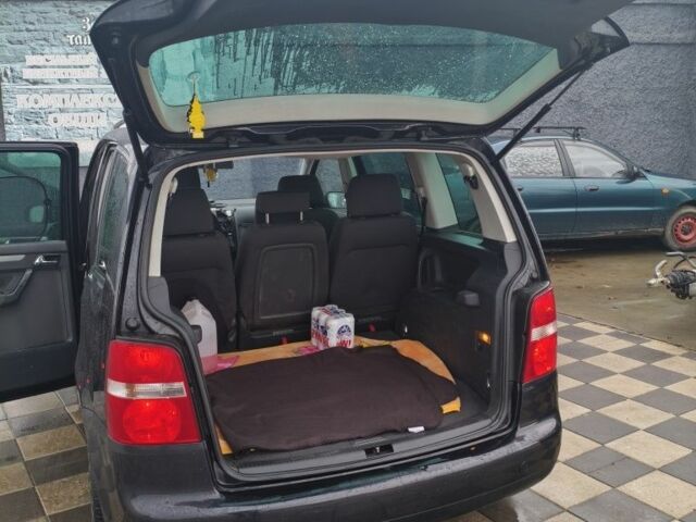 Черный Фольксваген Туран, объемом двигателя 2 л и пробегом 264 тыс. км за 6500 $, фото 3 на Automoto.ua