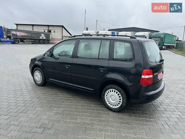 Черный Фольксваген Туран, объемом двигателя 1.6 л и пробегом 213 тыс. км за 5500 $, фото 10 на Automoto.ua