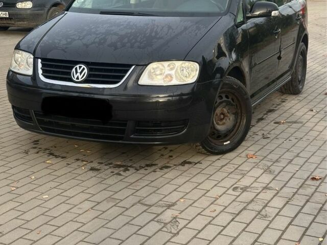 Чорний Фольксваген Туран, об'ємом двигуна 2 л та пробігом 300 тис. км за 2500 $, фото 7 на Automoto.ua