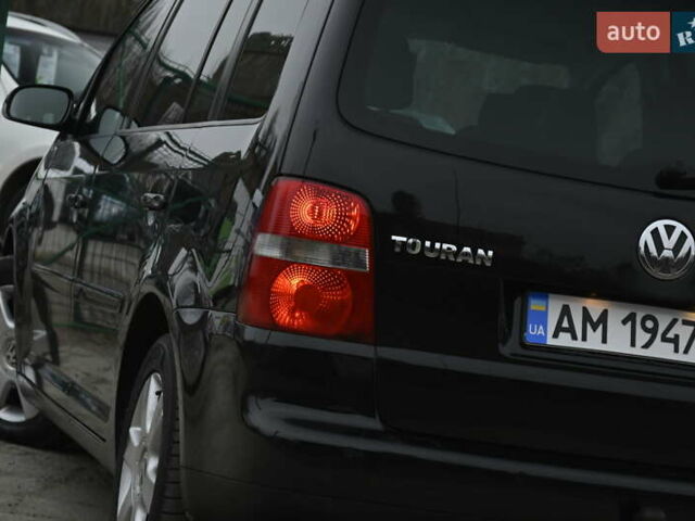 Чорний Фольксваген Туран, об'ємом двигуна 2 л та пробігом 267 тис. км за 5999 $, фото 8 на Automoto.ua