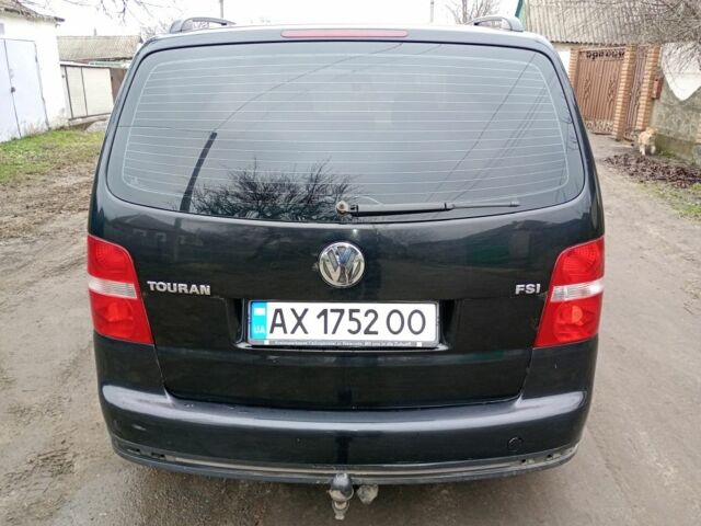 Черный Фольксваген Туран, объемом двигателя 1.6 л и пробегом 220 тыс. км за 6300 $, фото 5 на Automoto.ua