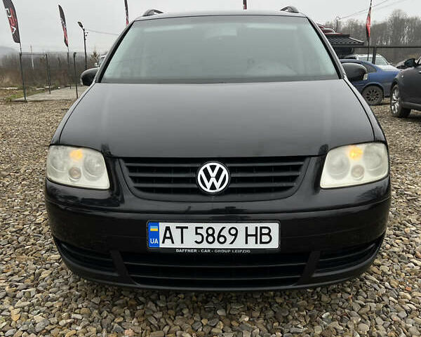 Черный Фольксваген Туран, объемом двигателя 1.6 л и пробегом 208 тыс. км за 5700 $, фото 3 на Automoto.ua