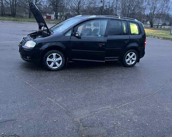 Черный Фольксваген Туран, объемом двигателя 1.97 л и пробегом 293 тыс. км за 5900 $, фото 18 на Automoto.ua