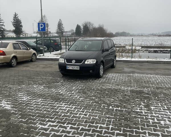 Черный Фольксваген Туран, объемом двигателя 1.6 л и пробегом 218 тыс. км за 5900 $, фото 3 на Automoto.ua