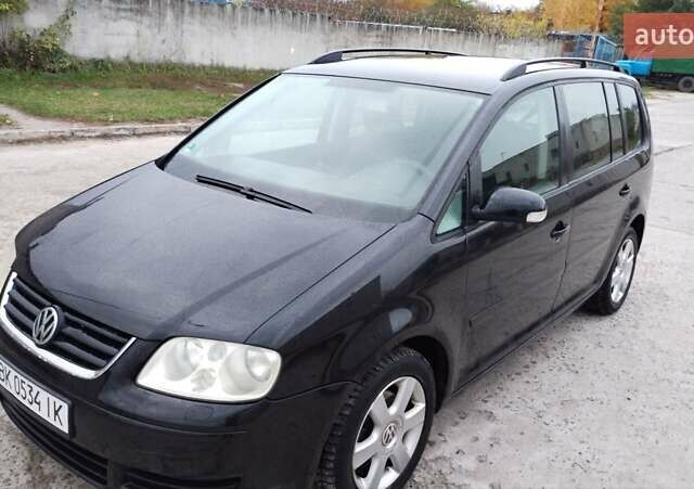 Чорний Фольксваген Туран, об'ємом двигуна 1.6 л та пробігом 249 тис. км за 5500 $, фото 3 на Automoto.ua