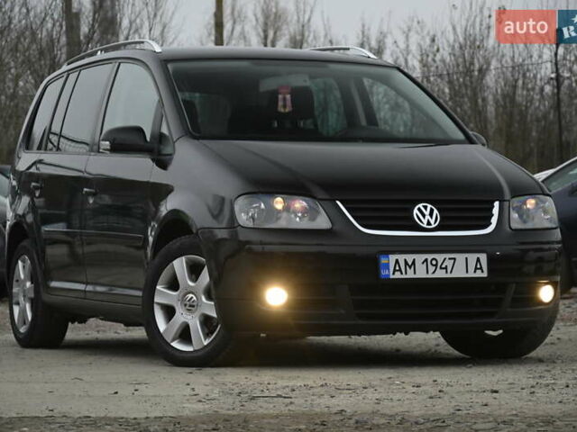 Чорний Фольксваген Туран, об'ємом двигуна 2 л та пробігом 267 тис. км за 5999 $, фото 1 на Automoto.ua