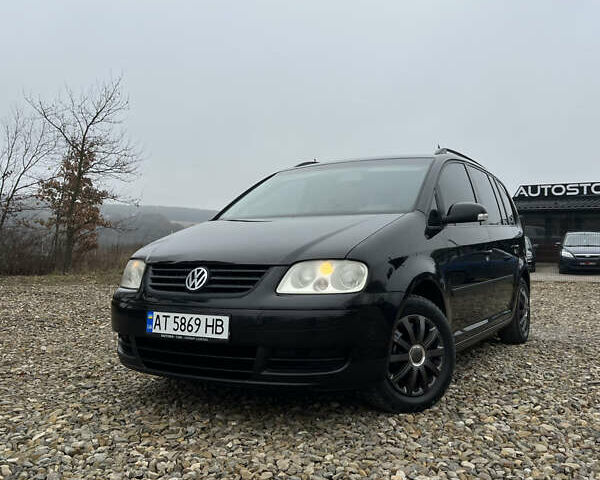 Черный Фольксваген Туран, объемом двигателя 1.6 л и пробегом 208 тыс. км за 5700 $, фото 2 на Automoto.ua