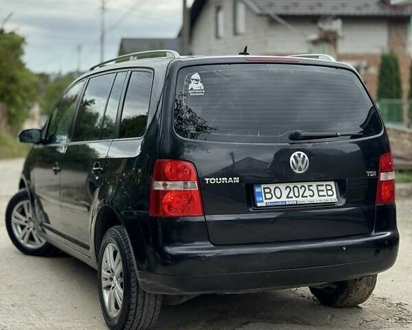 Черный Фольксваген Туран, объемом двигателя 1.98 л и пробегом 336 тыс. км за 5750 $, фото 11 на Automoto.ua