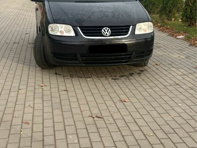 Чорний Фольксваген Туран, об'ємом двигуна 2 л та пробігом 300 тис. км за 2500 $, фото 3 на Automoto.ua