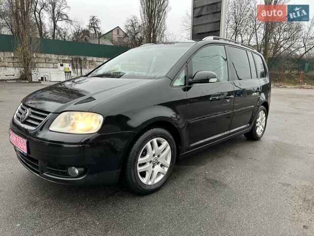 Черный Фольксваген Туран, объемом двигателя 1.6 л и пробегом 192 тыс. км за 5700 $, фото 2 на Automoto.ua
