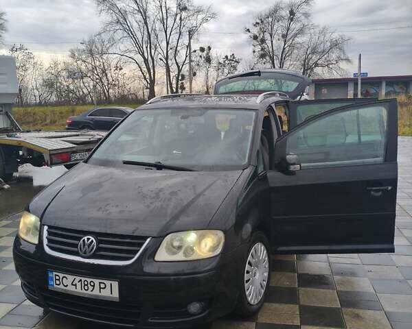 Чорний Фольксваген Туран, об'ємом двигуна 1.97 л та пробігом 262 тис. км за 6500 $, фото 6 на Automoto.ua