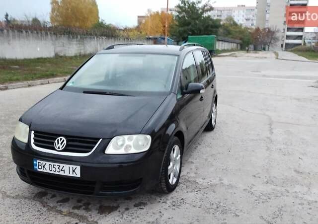 Чорний Фольксваген Туран, об'ємом двигуна 1.6 л та пробігом 249 тис. км за 5500 $, фото 14 на Automoto.ua